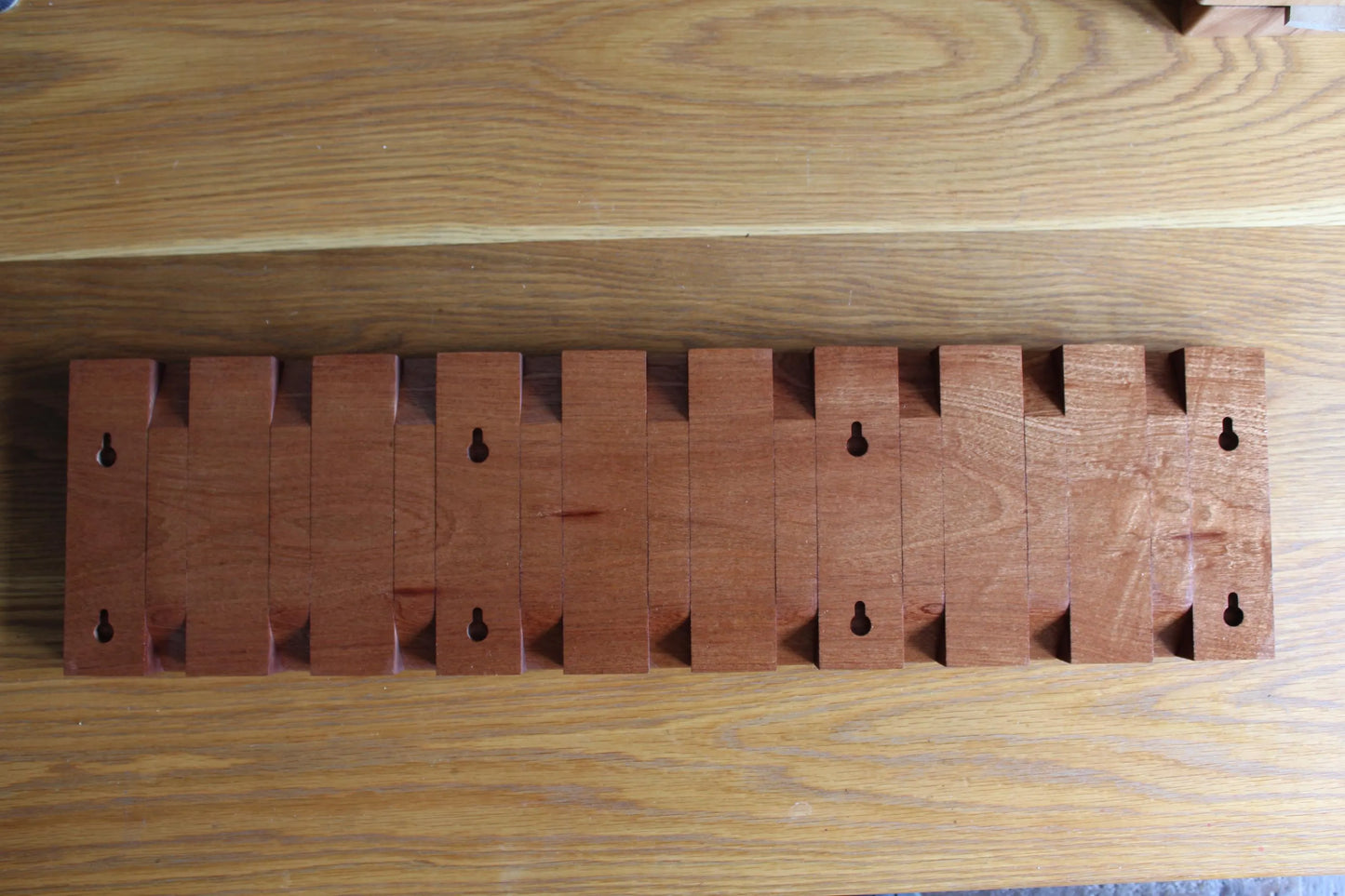 Oak and Sapele Flip-down Coat Rack
